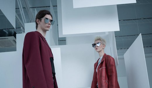 MYTH Greece’s WOKE & AWAKE Collection with two models in red showcasing the trendy luxury sunglasses